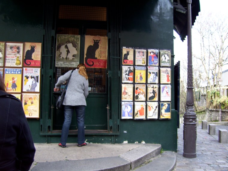Parisian shopkeeper closes her shop. Time to have a break!