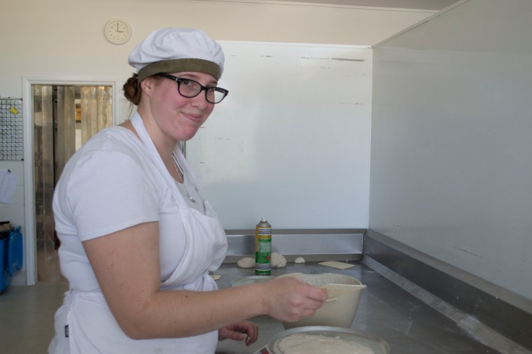 Casey the baker, whipping up some delicious gluten free dough at the Healthy Loaf Bakery